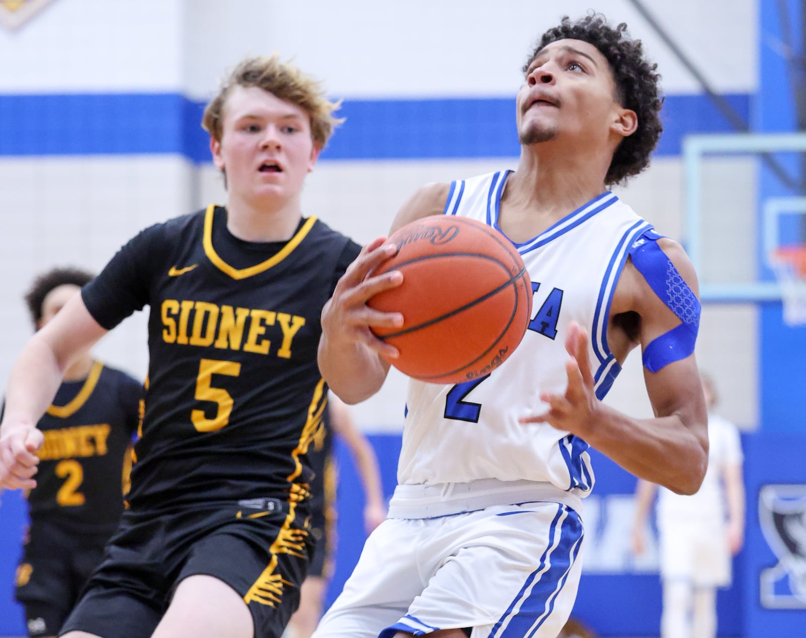Xenia junior guard Devin Withers drives with pressure from Sidney's Connor Widmark during the second half of a Miami Valley League game on Thursday, Dec. 4, 2025 at Phil Anderson Gymnasium in Xenia. Withers led the Buccaneers with 30 points in an 84-70 win. BRYANT BILLING/STAFF