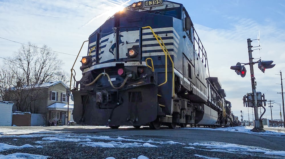 Hamilton to consider a quiet zone for the seven-crossing corridor through the center of town. Pictured is a CSX train traveling on Wednesday, Dec. 3, 2025, at the Maple Avenue train crossing. NICK GRAHAM/STAFF