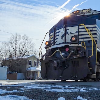 Hamilton to consider a quiet zone for the seven-crossing corridor through the center of town. Pictured is a CSX train traveling on Wednesday, Dec. 3, 2025, at the Maple Avenue train crossing. NICK GRAHAM/STAFF