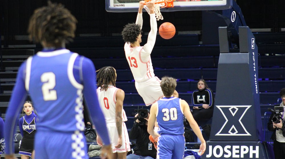 Lakota West’s Roman Combs slams one home against Hamilton on Monday, Jan. 20, 2026 at the Martin Luther King Classic at Xavier University’s Cintas Center. DIMITRIJE FISIC / CONTRIBUTED