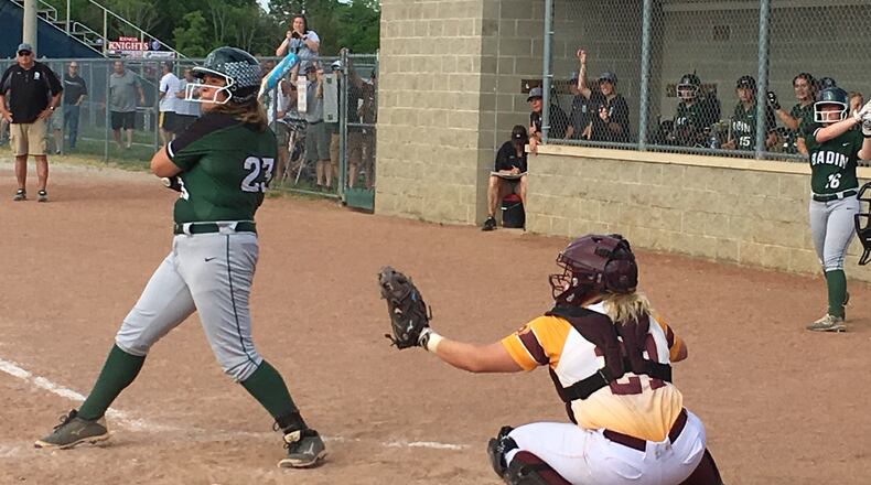 Badin’s Nicole Rawlings takes a cut in front of Ross catcher Whitley Arno during a Division II district semifinal May 15 at Kings. RICK CASSANO/STAFF