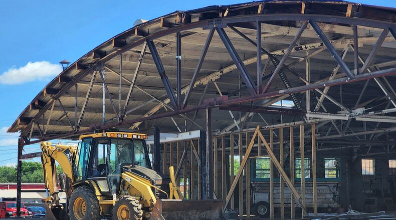 The art deco façade of the former Pepsi bottling building on Ohio 4 couldn't be saved as Third Eye Brewing works to convert the building into the brewery's second location. It's expected to open in 2023. NICK GRAHAM/STAFF