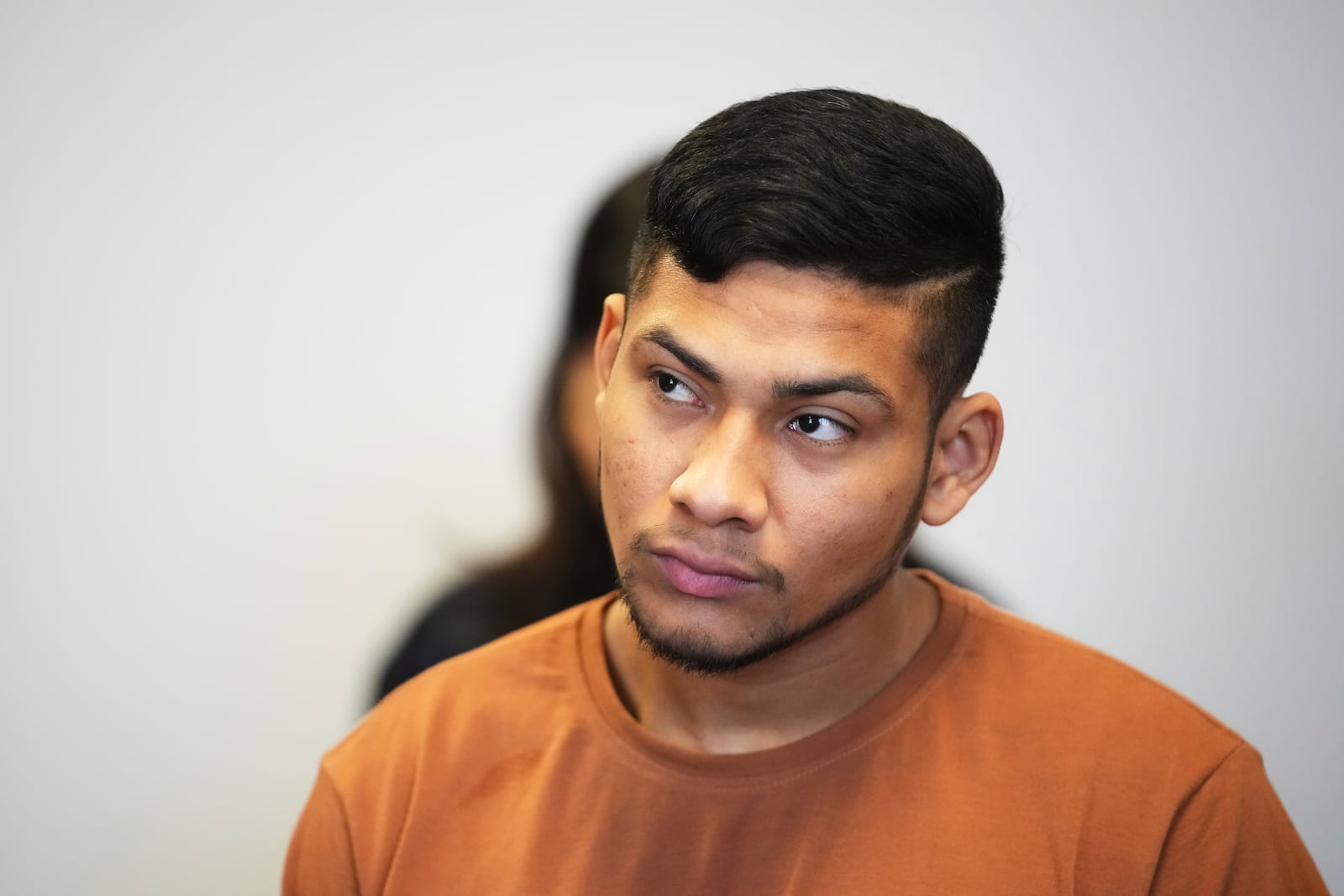 Columbian national Andres Alfons de la Hoz de la Cruz listens to a ruling, that sends him to spend eight years in prison for a terrorist attack and planning another one, at a court in Prague, Czech Republic, Monday, June 9, 2025. (AP Photo/Petr David Josek)