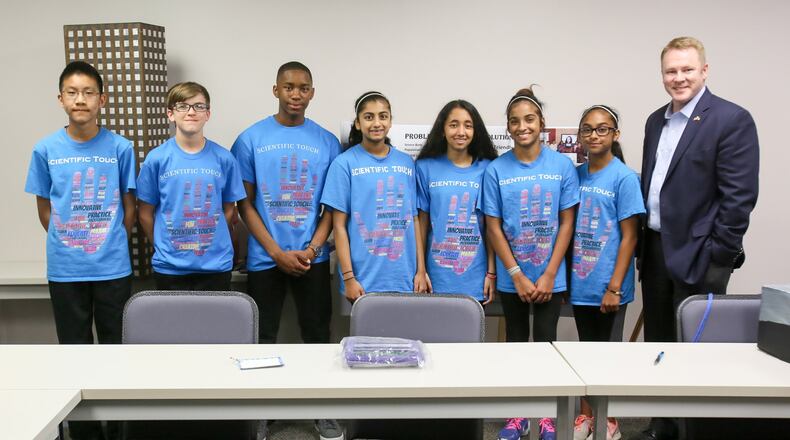 Middle school students from Lakota and other area districts that are part of the Scientific Touch team, met with Congressman Warren Davidson, Thursday, Apr. 20, 2017, at his office, to demonstrate their project before traveling to St. Louis for the world Lego science project championship. GREG LYNCH / STAFF