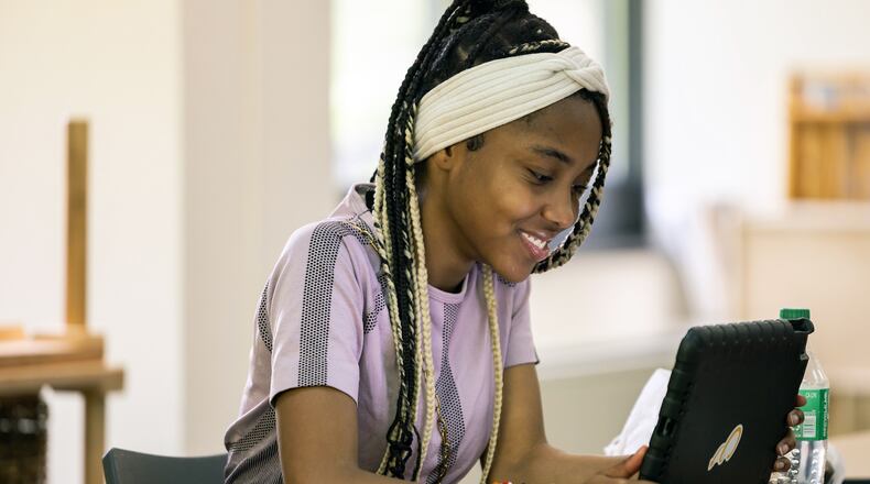 Students enrolled in the UpSpring 360 summer camp program spend the morning honing math and reading skills. Photo: Angie Liscomb Photography