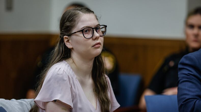 Abby Michaels sits in Montgomery County Common Pleas Judge Steven Dankof's courtroom in Dayton, Ohio, at the opening of her trial Monday, June 5, 2023. Michaels is accused of killing three members of a family from Mason during a wrong-way crash on Interstate 75 on St. Patrick's Day 2019. JIM NOELKER/STAFF