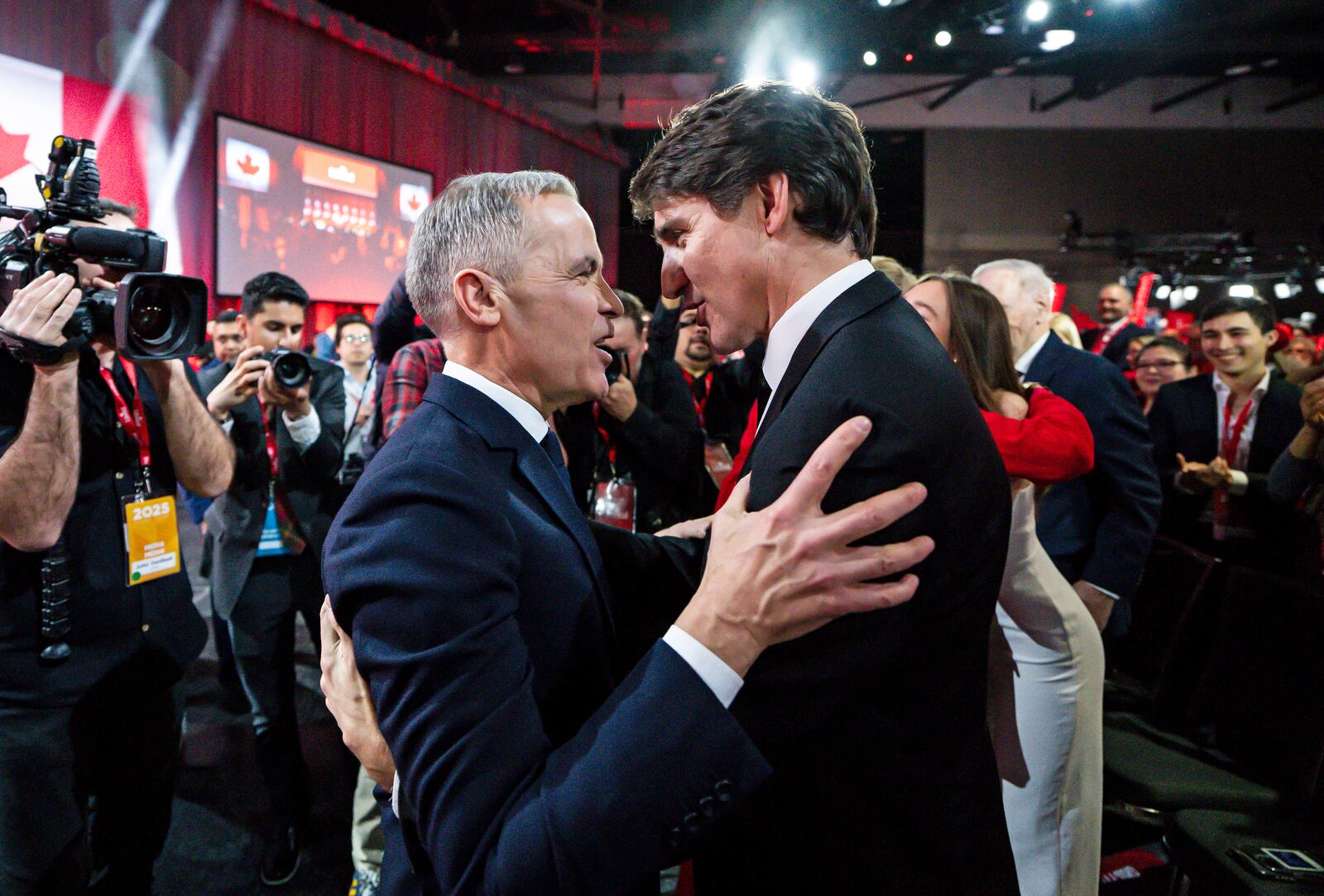 FILE - Mark Carney, Leader of the Liberal Party of Canada, embraces Prime Minister Justin Trudeau after being announced the winner at the Liberal Leadership Event in Ottawa, Ontario, March 9, 2025. (Justin Tang/The Canadian Press via AP, File)
