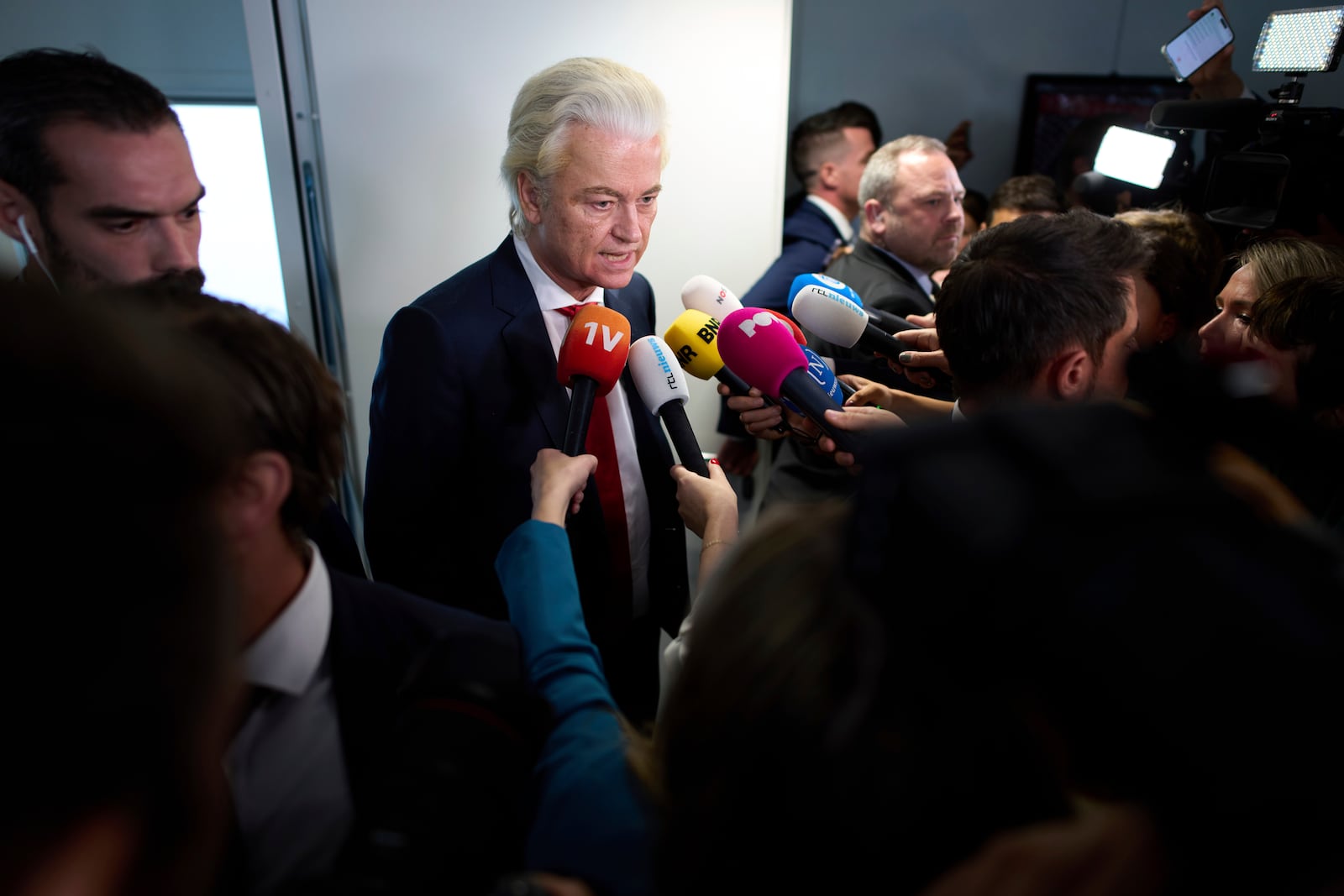 Far-right lawmaker Geert Wilders talks to the media after pulling his party out of the four-party Dutch coalition in The Hague, Netherlands, Tuesday, June 3, 2025. (AP Photo/Peter Dejong)