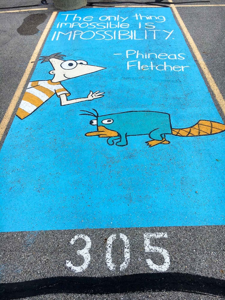 PHOTOS Lakota East seniors paint parking spots