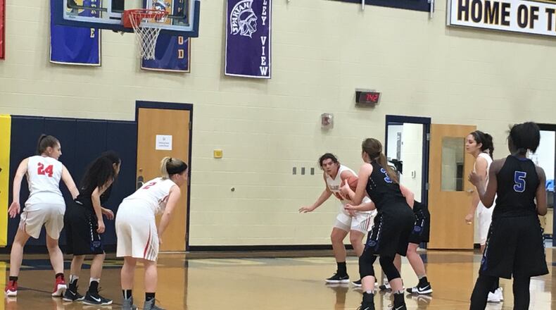 Cincinnati Christian’s Grace Edmonston prepares to put up a foul shot Thursday night during a Division IV sectional game against South Charleston Southeastern at Monroe. RICK CASSANO/STAFF