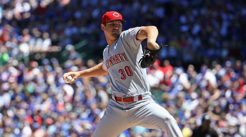 CHICAGO, IL - JULY 06: Starting pitcher Tyler Mahle #30 of the Cincinnati Reds delivers the ball against the Chicago Cubs at Wrigley Field on July 6, 2018 in Chicago, Illinois. (Photo by Jonathan Daniel/Getty Images)