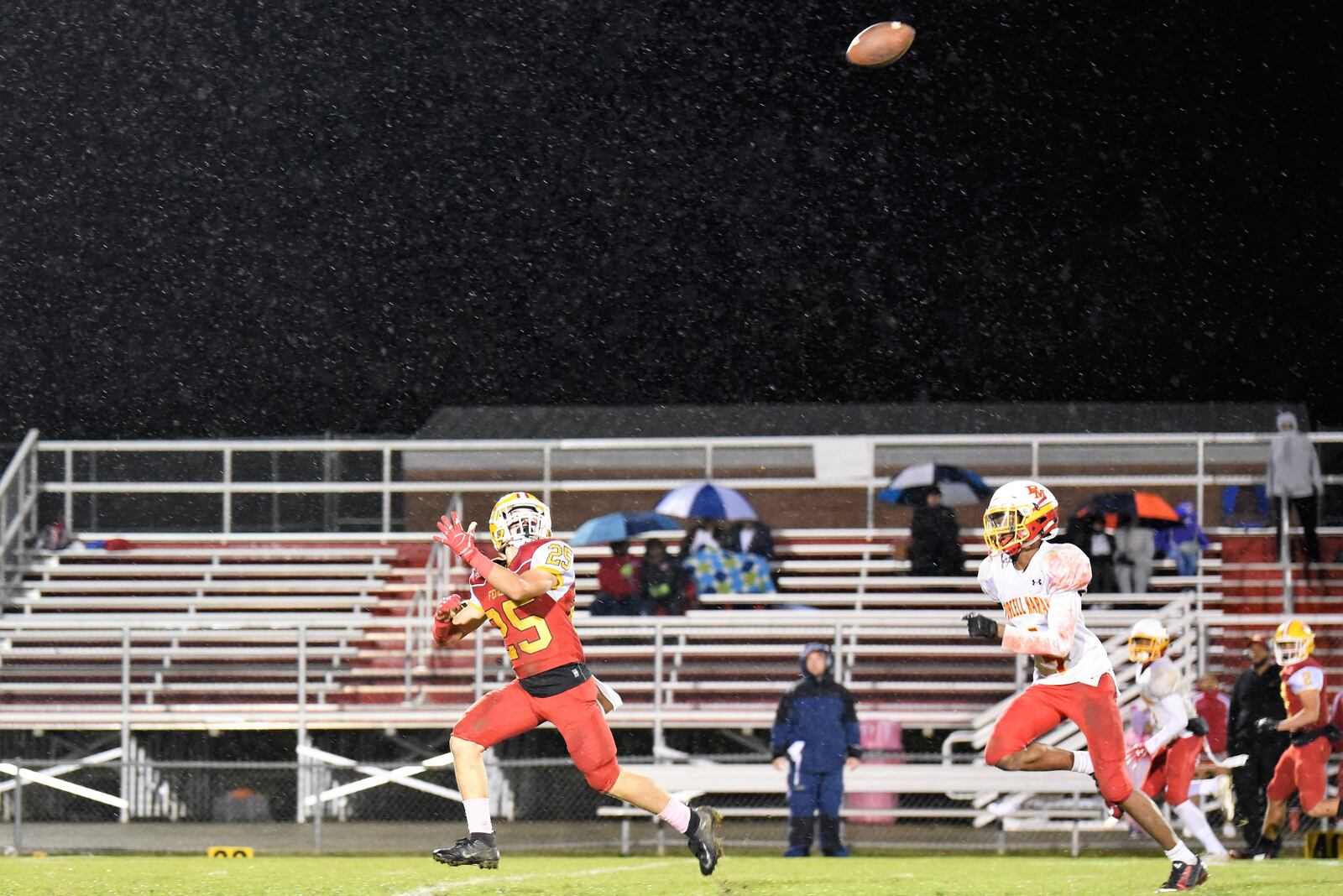 Fenwick’s David Schuh (25) is about to catch a touchdown pass from Sully Janeck on Friday night, helping the Falcons defeat visiting Purcell Marian 31-14 at Krusling Field in Middletown. CONTRIBUTED PHOTO BY ANGIE MOHRHAUS