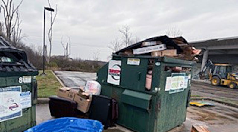 Scenes like these with overflowing recycling bins and unacceptable materials being left at Liberty Twp.’s fire station 111 and services building have prompted trustees to have the bins removed effective April 30. Contributed photo