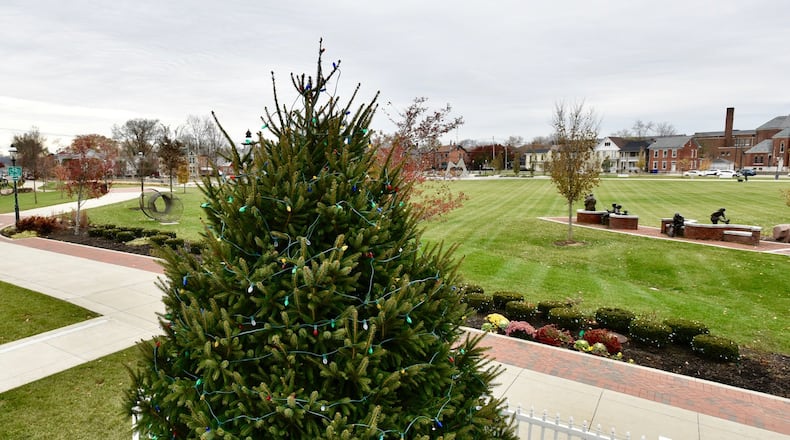 Last year, the Hamilton Christmas tree lighting was moved from the lawn of the Butler County Historic Courthouse to Marcum Park, and more than 2,500 people celebrated. It will happen there again this year, with more activities than last year. NICK GRAHAM/STAFF
