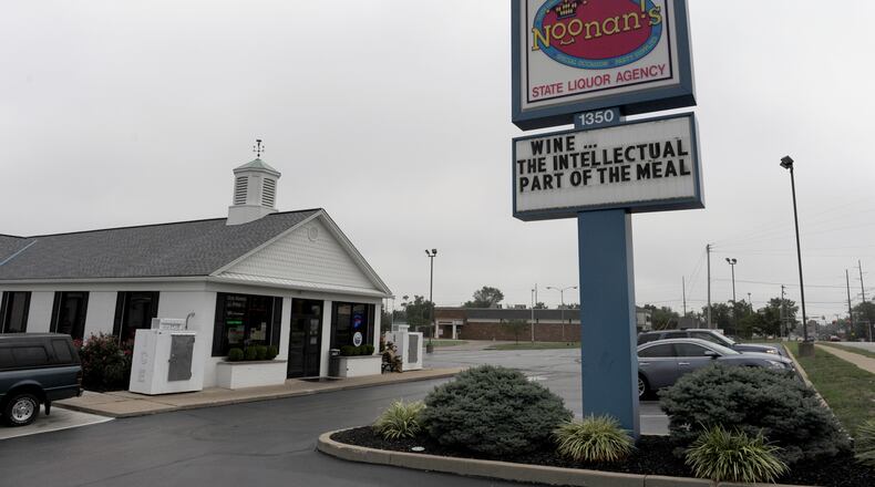 Hamilton police are investigating a break-in early Wednesday morning at Noonan’s liquor store on Main Street. STAFF FILE PHOTO.