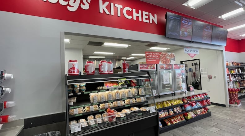 This is the kitchen inside Casey's on Princeton Road in Fairfield Twp., near Menard's. A manager working there said they will pretty much make anything a hungry patron requests and its most popular choice is pizza. STAFF PHOTO