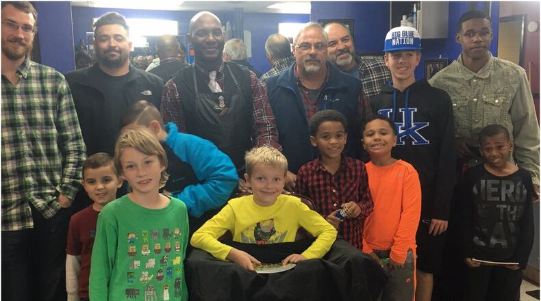 The Barbershops, Books & Boys Program aims to boost reading literacy and self-confidence through engaging both students and family members. CONTRIBUTED