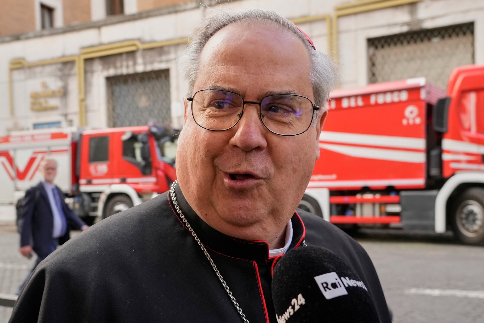 Argentine Cardinal Ángel Sixto Rossi speaks to reporters as he arrives for a college of cardinals' meeting, at the Vatican, Monday, April 28, 2025. (AP Photo/Gregorio Borgia)