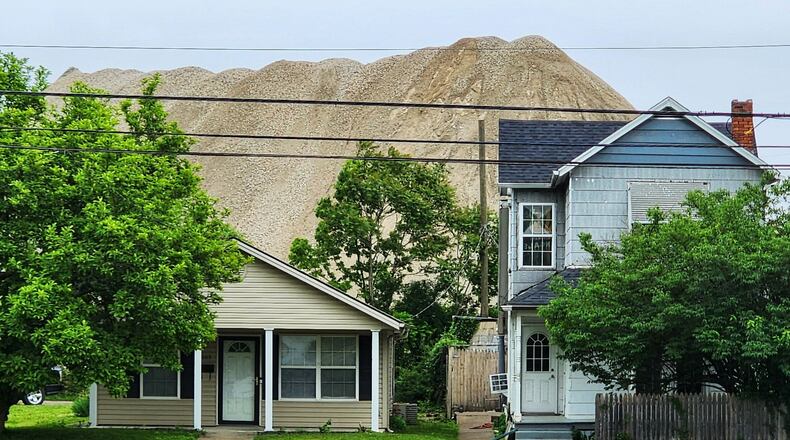 Marva Gaston, a Middletown citizen, spoke at the last two city council meetings urging the city to clear out the former Paperboard site debris that sits across from her home. NICK GRAHAM/STAFF