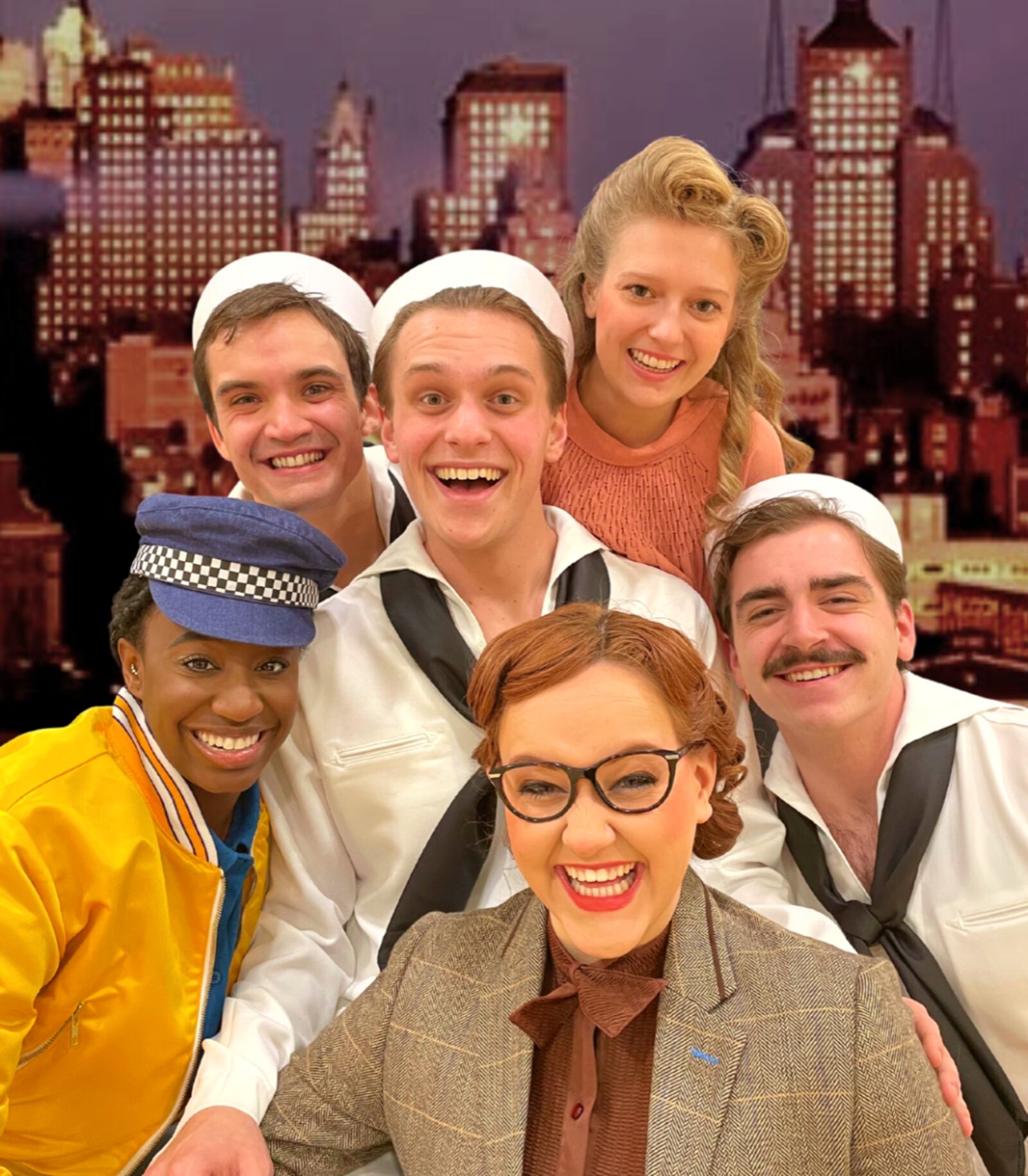 Tanner Gleeson (Gabey), center, (clockwise from upper right) Amy VanDyke (Ivy Smith), John Cuozzo (Ozzie), Melissa Matarrese (Claire de Loone) and Trinity Woolf (Hildy Esterhazy) in Wright State University's production of "On the Town." PHOTO BY WRIGHT STATE THEATRE