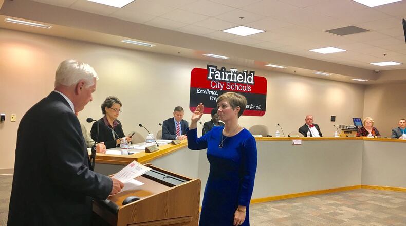 Newly appointed Fairfield Board of Education member Carrie O’Neal was sworn on to the board Thursday evening after board members voted unanimously to appoint her. O’Neal takes over the seat vacated by the death of board Vice President Jerome Kearns last month. MICHAEL D. CLARK/STAFF