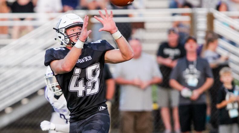 Lakota East's Charlie Kenrich makes a catch and runs in for a touchdown during their football game against Middletown Friday, Sept. 20, 2019 at Lakota East High School in Liberty Township. Lakota East defeated Middletown 21-9. NICK GRAHAM/STAFF