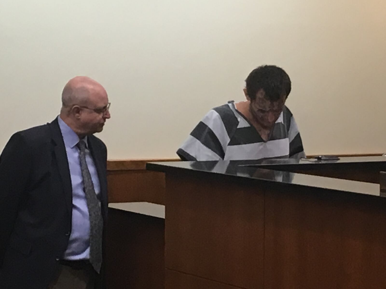 Ebb Duhamel, 30, of Middletown, enters guilty pleas in Middletown Municipal Court Friday following a two-hour standoff with police on Thursday on Baltimore Street. Duhamel is also facing charges in Franklin Municipal Court stemming from another standoff with Warren County Sheriff’s deputies on Wednesday in Franklin Twp. RICK MCCRABB/STAFF