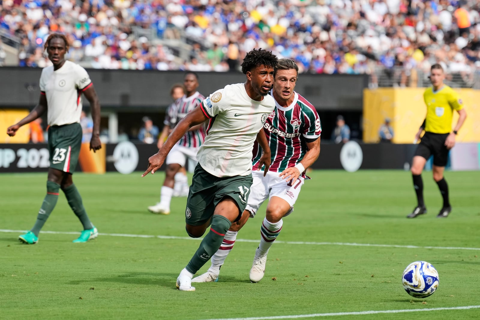 Chelsea's Andrey Santos (17), left, and Fluminense's Agustin Canobbio (17) battle for the ball during the Club World Cup semifinal soccer match between Fluminense and Chelsea in East Rutherford, N.J., Tuesday, July 8, 2025. (AP Photo/Seth Wenig)