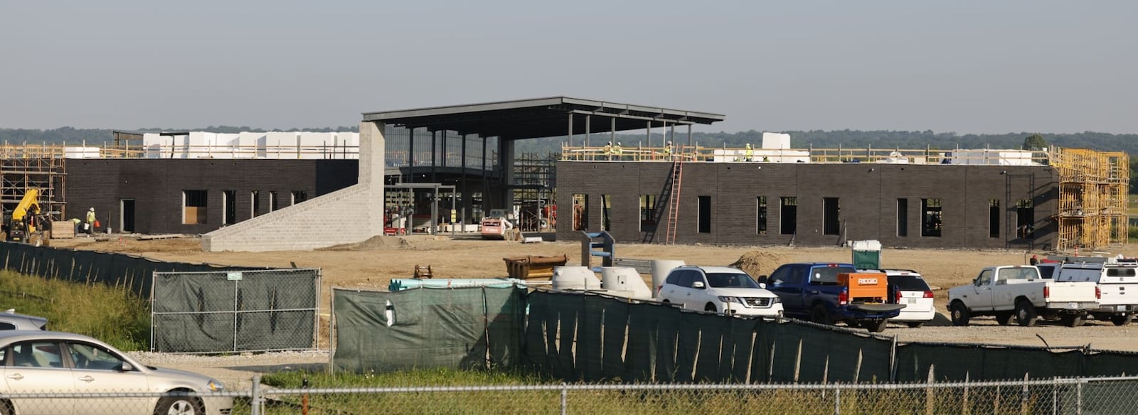A $15 million, custom-built aviation school for Butler County high school students is on the glide path to completion at Middletown’s airport.
The construction of southwest Ohio’s largest airport-located aviation career training center is on schedule for its February 2026 opening and workers recently topped out the 30,000-square-foot school next to the airstrip at Middletown Regional Airport. (Photo By Nick Graham/Journal-News)