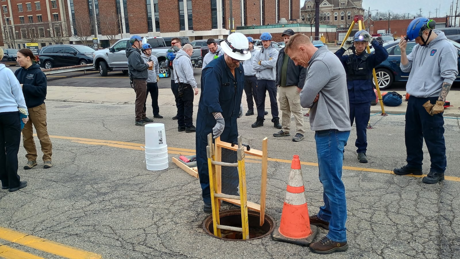 Officials from the Butler County Emergency Management Agency, the Butler County Coroner’s Office and Hamilton Police Department search the underground sewer system on Market Street Friday, March 20, 2026. Authorities were looking for any additional remains or evidence connected to the death of William Lee Campbell, who went missing in 2022, but whose remains were discovered in the sewer last August. PHOTO COURTESY OF HAMILTON POLICE DEPARTMENT