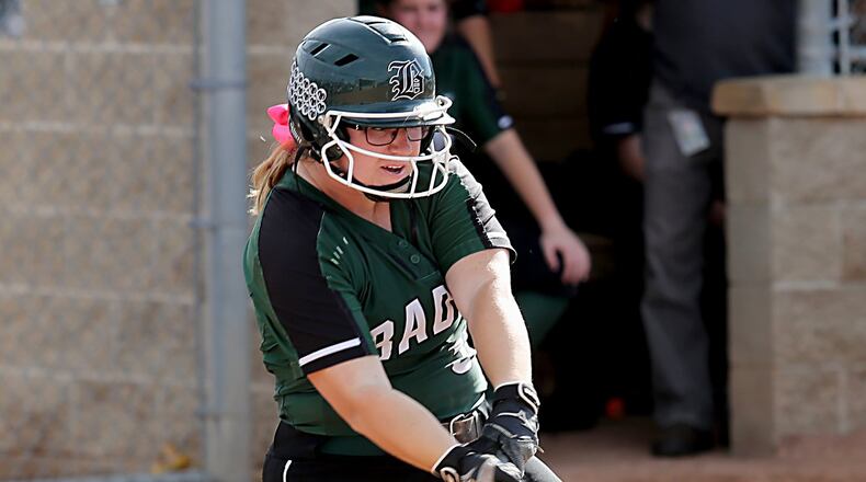 Badin’s Maddie Curtner connects for a hit against Clermont Northeastern on Monday during a Division III district final at Kings. CONTRIBUTED PHOTO BY E.L. HUBBARD