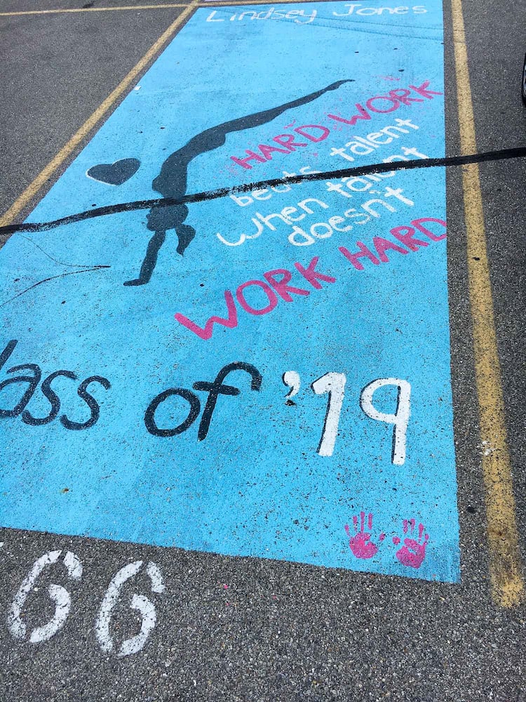 PHOTOS Lakota East seniors paint parking spots