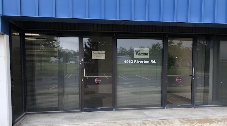 Tomco Machining is moving from this rented space in North Dayton to a new 24,000-square foot building in Springboro. STAFF/LAWRENCE BUDD