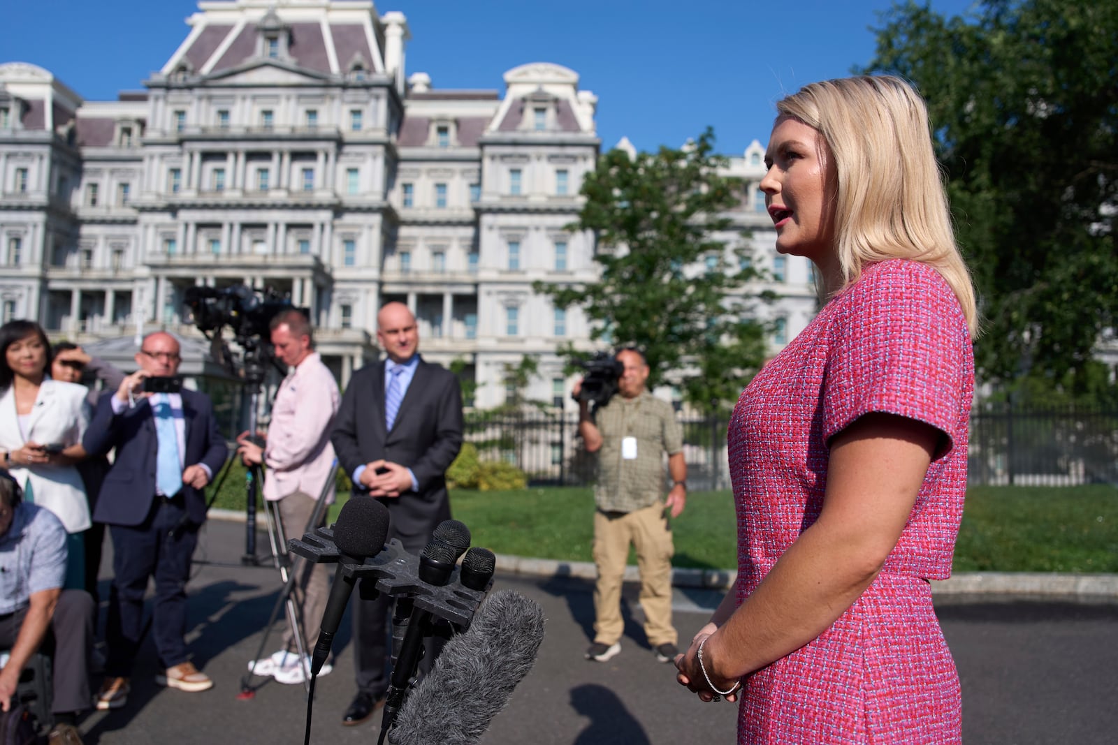 White House press secretary Karoline Leavitt talks with reporters at the White House, Monday, June 23, 2025, in Washington. (AP Photo/Evan Vucci)