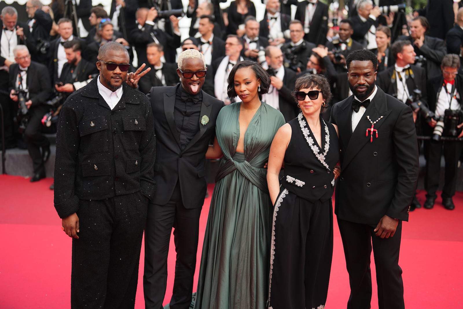 Wale Davies, from left, Akinola Davies, Funmbi Ogunbanwo, Rachel Dargavel and Sope Dirisu pose for photographers upon arrival at the premiere of the film 'The Phoenician Scheme' at the 78th international film festival, Cannes, southern France, Sunday, May 18, 2025. (Photo by Lewis Joly/Invision/AP)