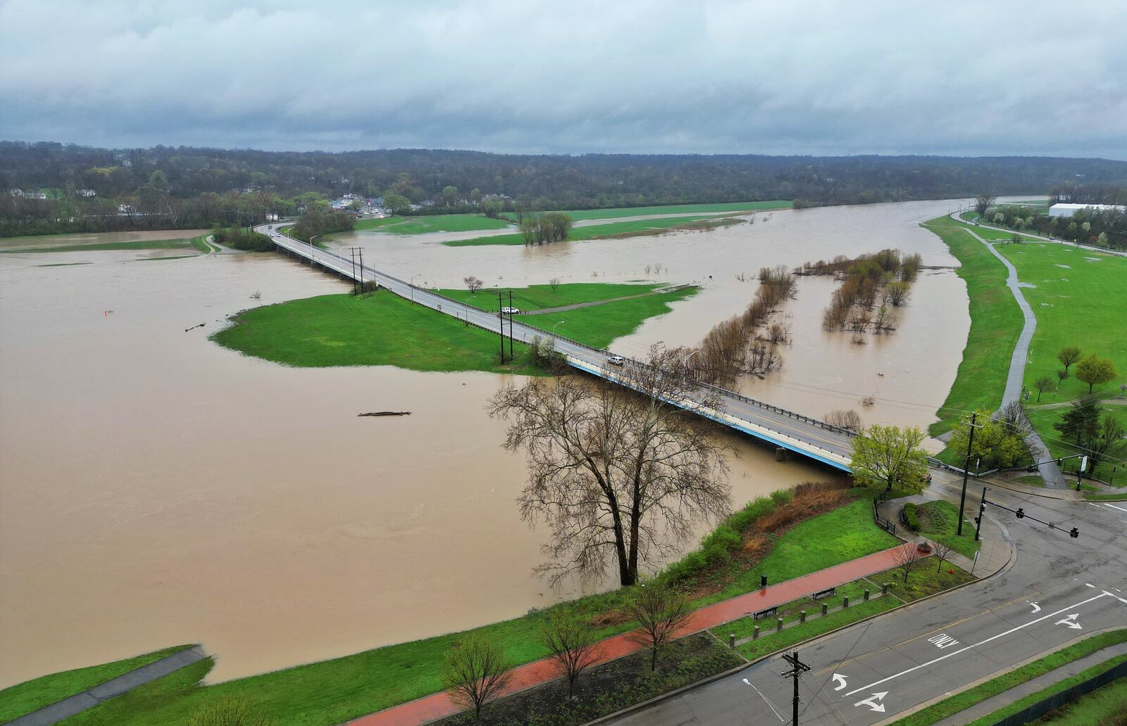 The level of the Great Miami River is up after several days of heavy rain Saturday, April 5, 2025 near the Ohio 122 bridge in Middletown. NICK GRAHAM/STAFF