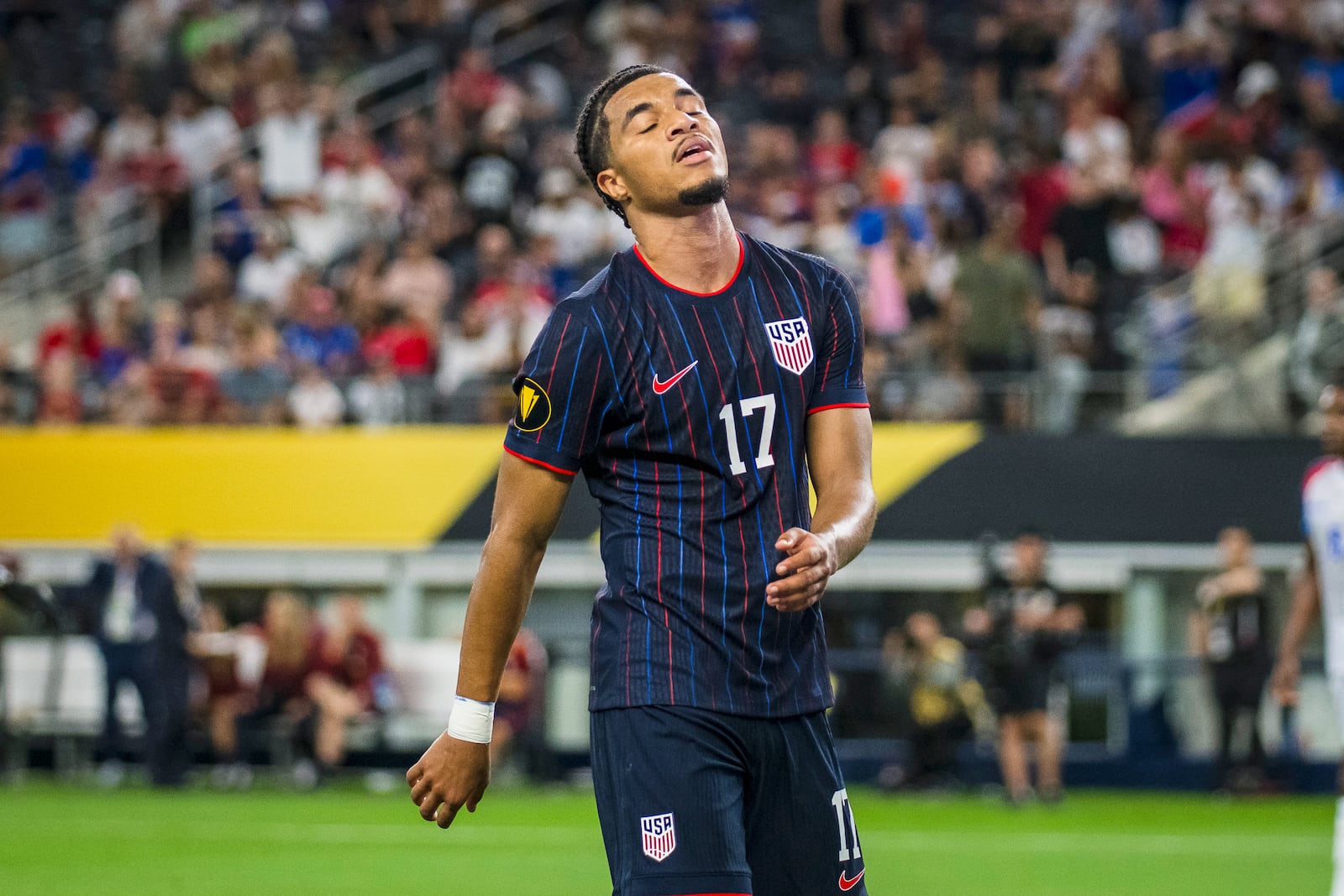 United States forward Malik Tillman (17) reacts after missing a chance at goal during a CONCACAF Gold Cup soccer match against Haiti, Sunday, June 22, 2025, in Arlington, Texas. (AP Photo/Jessica Tobias)