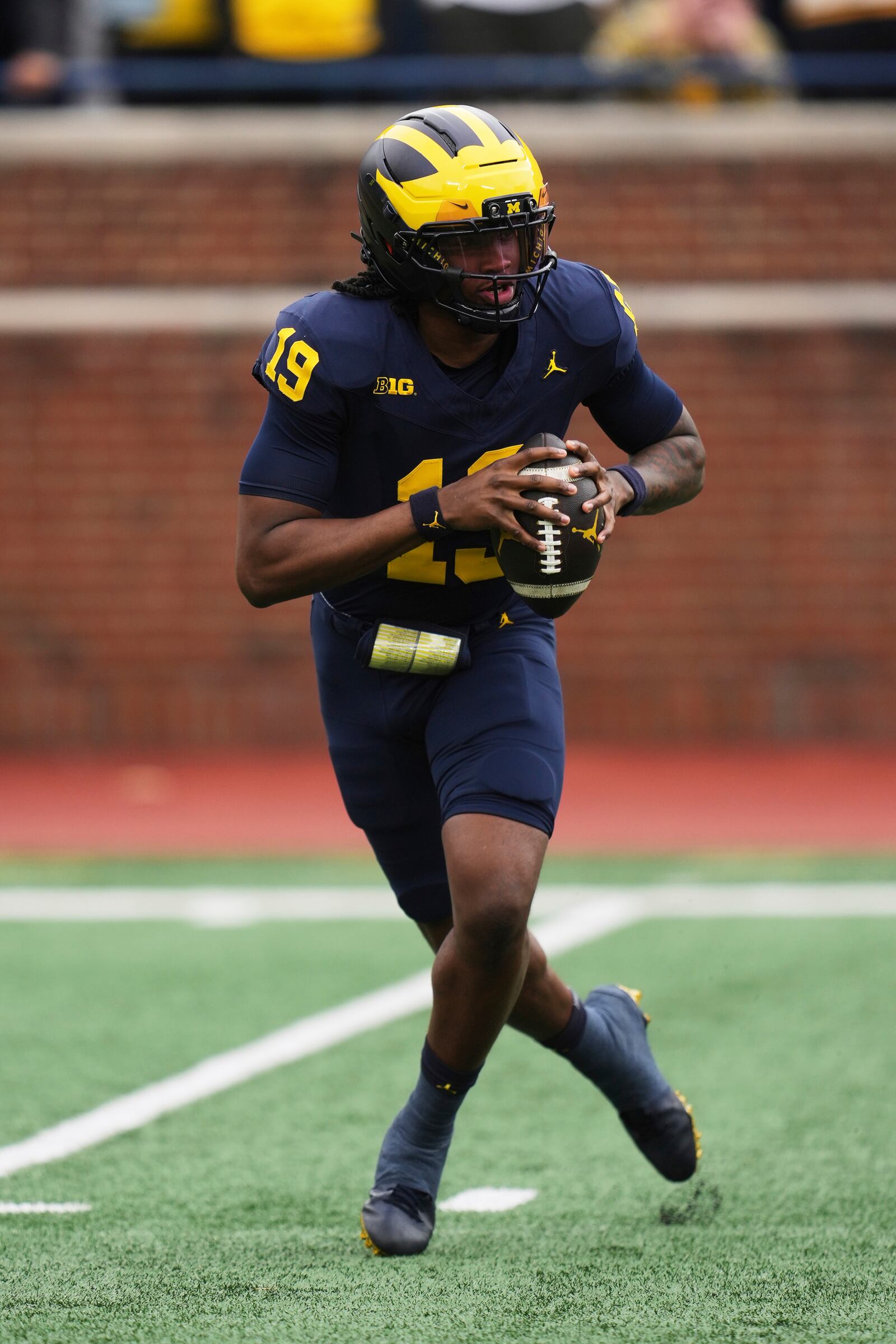 Michigan quarterback Bryce Underwood throws during an NCAA college football spring game in Ann Arbor, Mich., Saturday, April 19, 2025. (AP Photo/Paul Sancya)