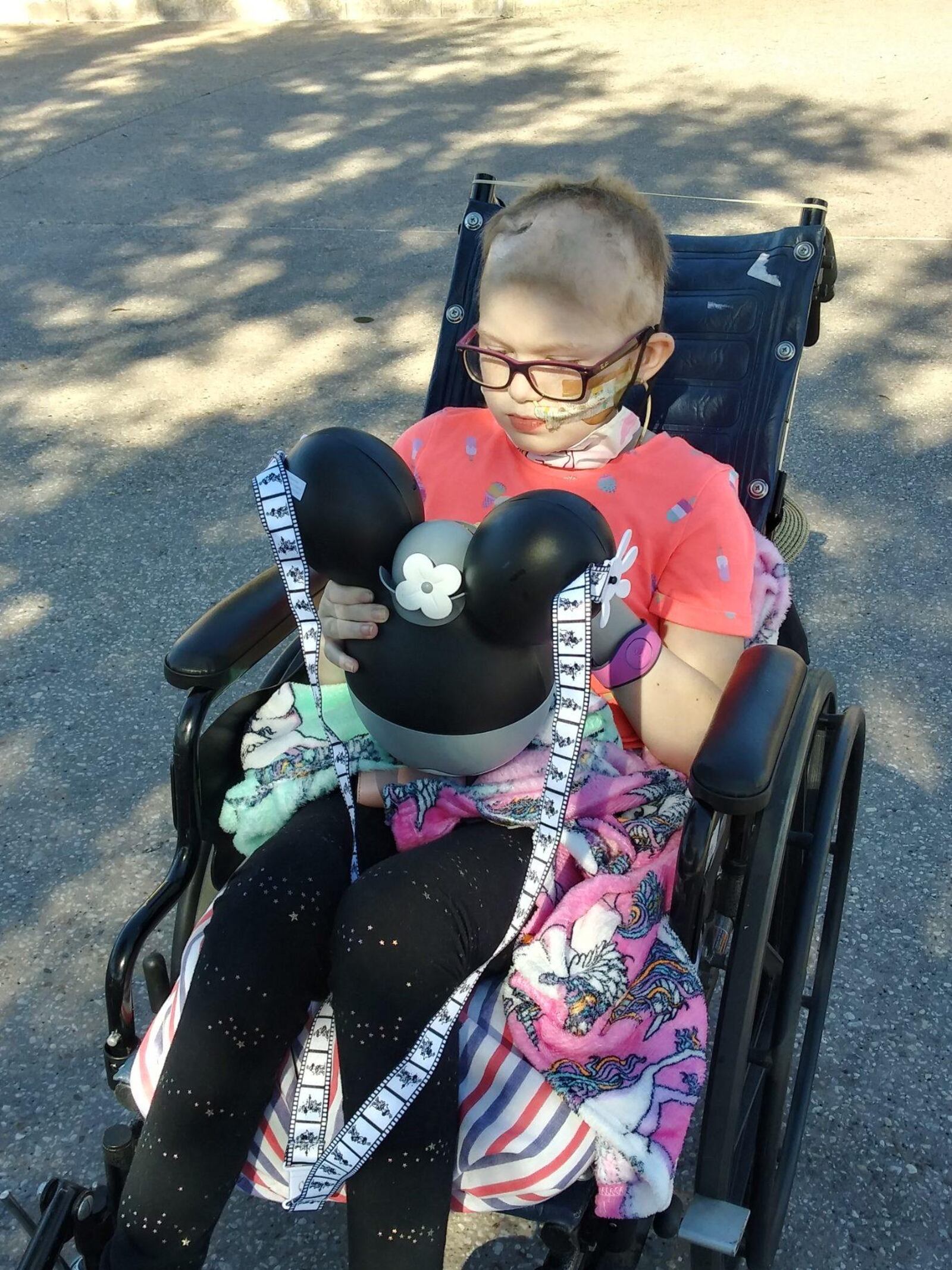 Naomi Short, 9, of Hamilton, and her parents are in Orlando this week touring several Disney properties. Naomi has a rare form of brain cancer. SUBMITTED PHOTO