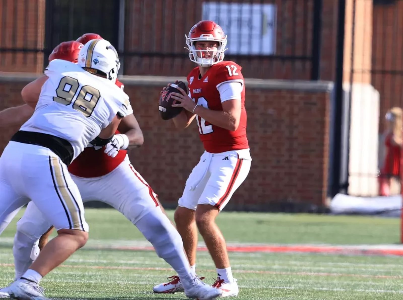 In his first-ever start at Yager Stadium, Henry Hesson, Miami’s fifth-year quarterback, threw for 204 yards and two touchdowns to lead the RedHawks to a 38-0 victory over Lindenwood University in Saturday’s Homecoming game at Yager Stadium. JEFFREY SABO / CONTRIBUTED PHOTO