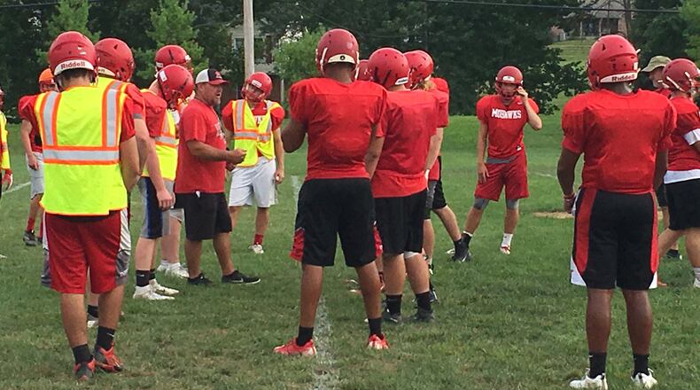 Madison coach Steve Poff directs his team during a recent practice at the school. RICK CASSANO/STAFF