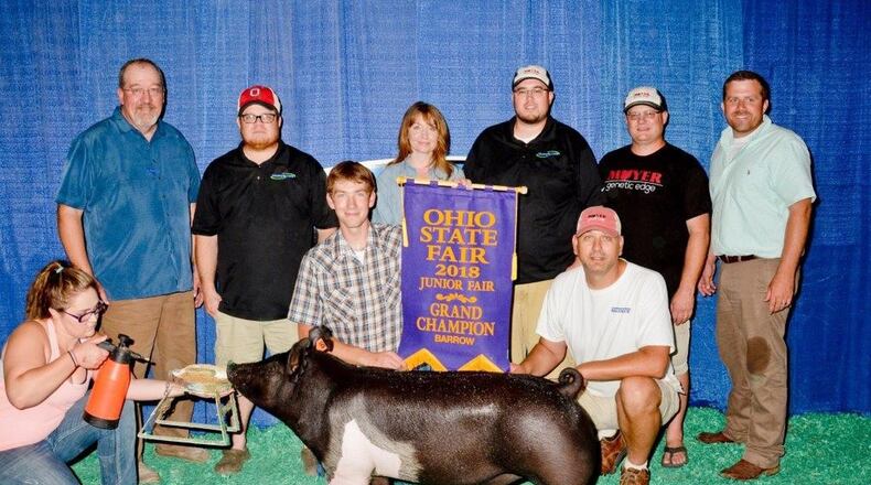 Talawanda senior Matt Butterfield and his market barrow won the top prize at the Ohio State Fair, his second year in a row accomplishing that. This year’s entry, Repeat, was also the top money-earner at the Sale of Champions, topping the winning market beef, which traditionally draws the largest bid. CONTRIBUTED