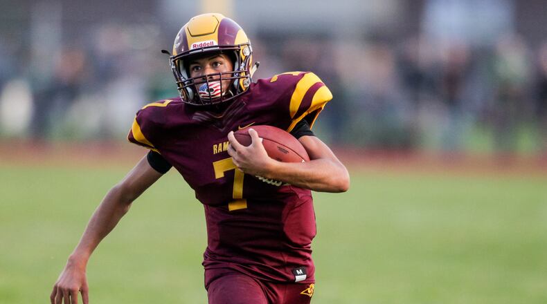 Ross quarterback CJ Boze and the Rams blitzed Edgewood 63-35 on Friday night to win the Southwest Ohio Conference title. Nick Graham/FILE