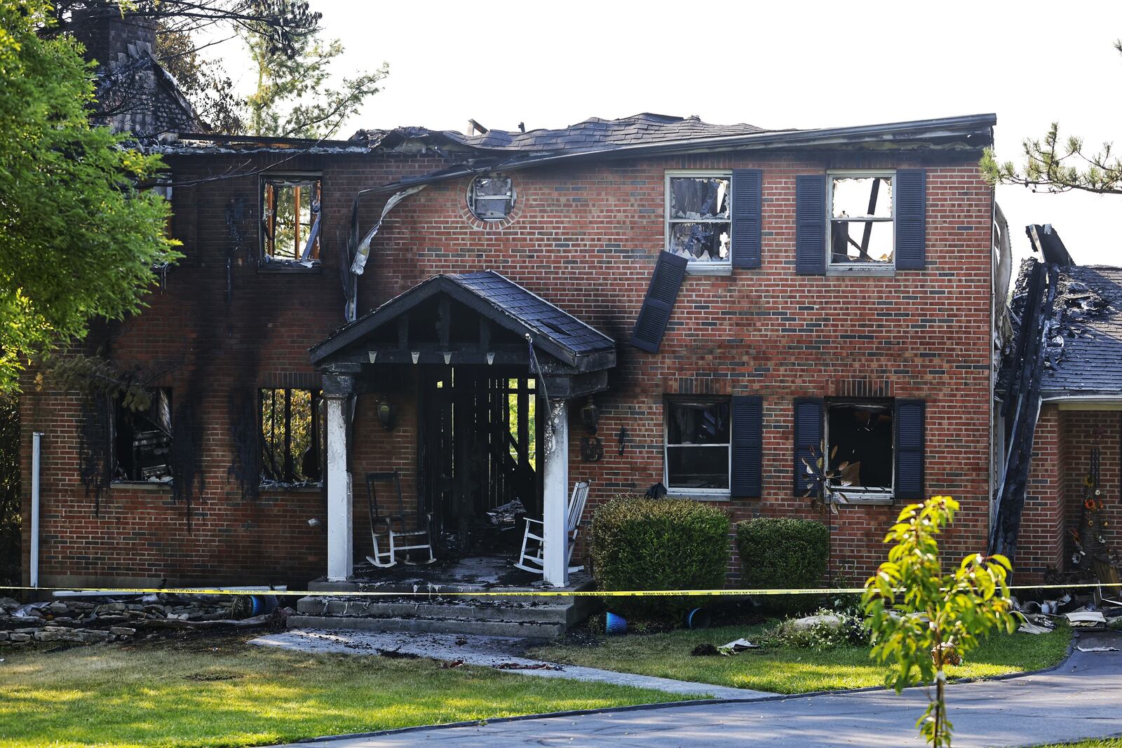 An early Sunday fire caused about $300,000 in damages to the structure and contents of this home on Mosiman Road. NICK GRAHAM/STAFF
