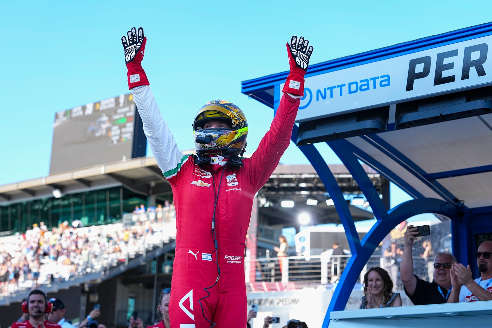 Robert Shwartzman, of Israel, celebrates after winning the pole position during qualifications for the Indianapolis 500 auto race at Indianapolis Motor Speedway in Indianapolis, Sunday, May 18, 2025. (AP Photo/Michael Conroy)