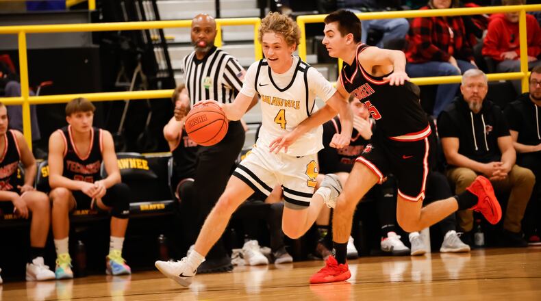 Shawnee High School junior guard Charlie Lemon drives past Tecumseh senior Brycen Dixon during their game on Tuesday night in Springfield. The Arrows won 45-41. CONTRIBUTED PHOTO