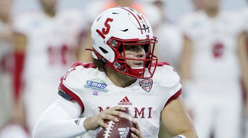 DETROIT, MI - DECEMBER 7: Quarterback Brett Gabbert #5 of the Miami (Oh) Redhawks looks to pass the ball against the Central Michigan Chippewas during the first half of the MAC Championship at Ford Field on December 7, 2019, in Detroit, Michigan. (Photo by Duane Burleson/Getty Images)