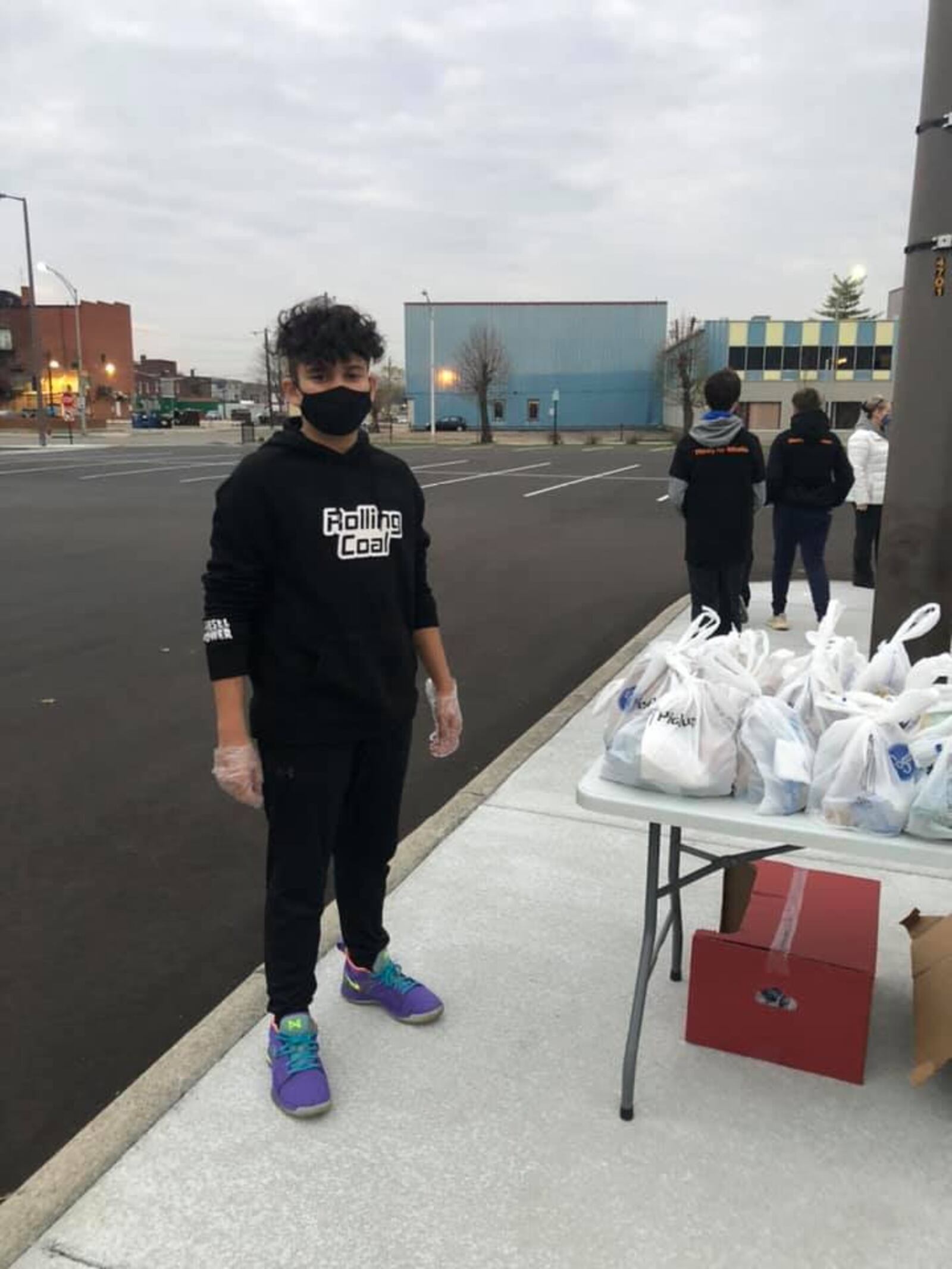 Ashtyn Bennett, of Middletown, took the $150 his parents gave him for his 14th birthday and used the money to buy food for the homeless. Ashtyn and his friends served 78 homeless meals Friday in downtown Middletown. SUBMITTED PHOTO