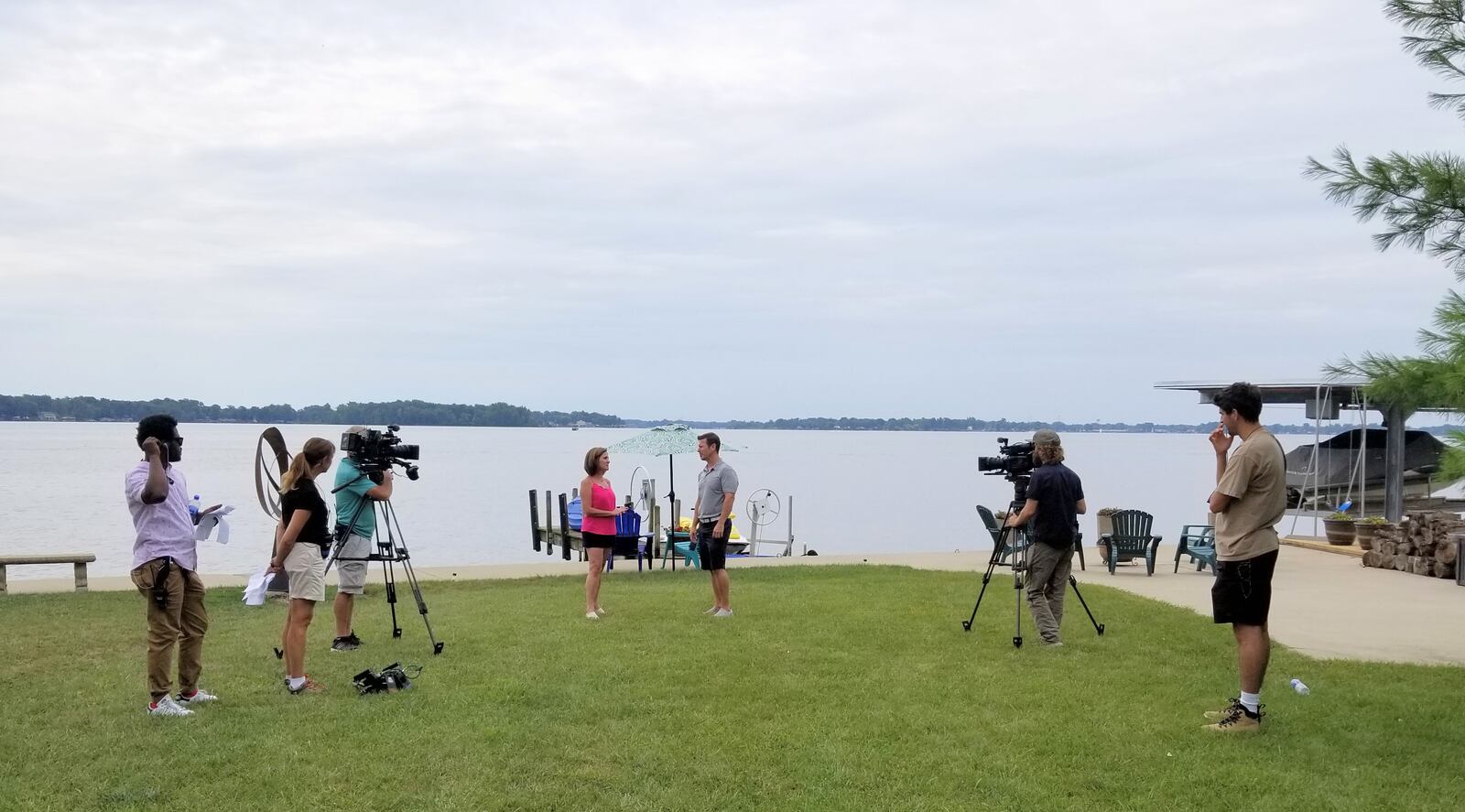 Dayton area residents Chris and Tina Gibbs (center)  and members the crew of HGTV's "Island Life."