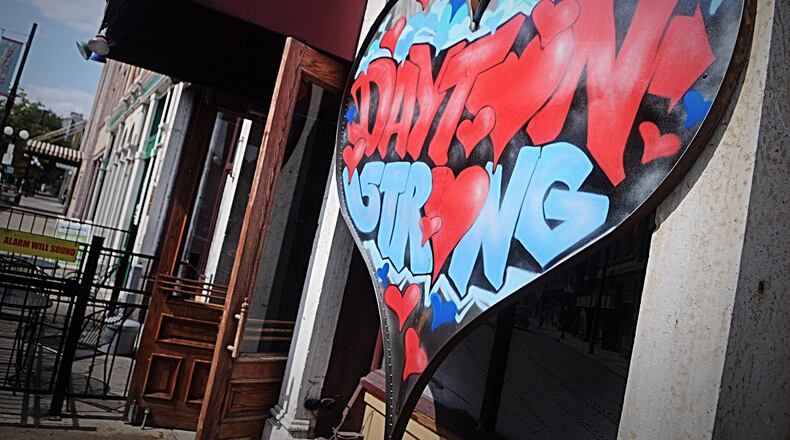 Makeshifts memorial can still be seen in the Oregon District nearly three months after the Aug. 4, 2019 mass shooting in which nine people were killed and 27 injured. Residents and business owners say they are still dealing with the trauma caused by the killings.